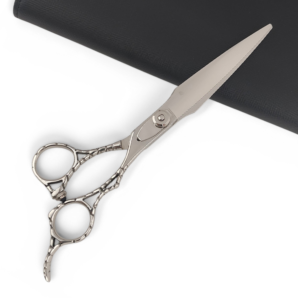 Precision scissor-over-comb control detail